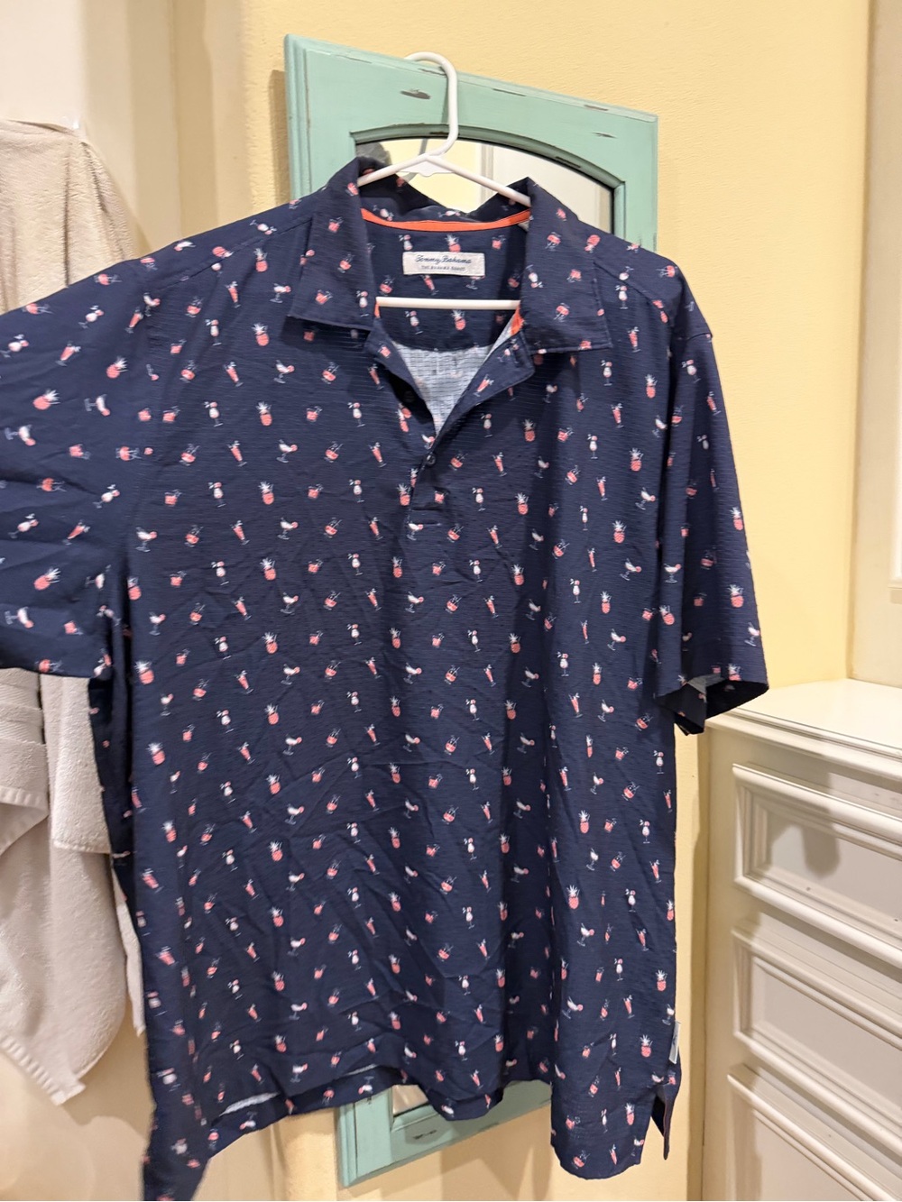 Tommy Bahama Navy Polo with Pink Pineapple Motif